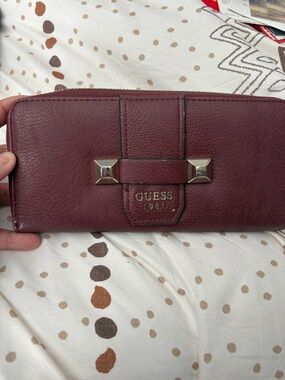 GUESS Burgundy Leather Zip Wallet with Gold Stud Accents
